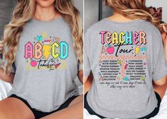 Join the ABCD Teacher Tour in style with our Back To School Tshirt, perfect for bringing humor and joy to the classroom. This Funny Teacher Shirt is not only witty but also serves as a charming End of Year Shirt, commemorating the journey of educators throughout the school year. Embrace the spirit of teaching with this Kindergarten Teacher T-shirt, designed to inspire and engage young learners in elementary school. Product Description: ⇝ Bella and Canvas Brand Shirts ⇝ Unisex Adult Sizing ⇝ Rolled Sleeves in pictures are for styling purposes only ⇝ Props used in photos for are NOT included with purchase ⇝ Please consult the listing image for information regarding the sizes available for the T-shirt. ⇝ When applicable, white shirts will be printed with black letters. ⇝ CARE INSTRUCTIONS * W End Of The Year Teacher Shirts, Back To School Shirts For Teachers, Elementary School Tshirt Designs, Teacher Tee Shirts, Zebra Shirt, Kindergarten Teacher Shirts, Funny T Shirt Sayings, School Tees, Kindergarten Teacher