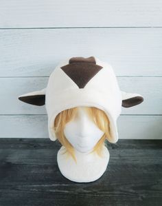 This Bison hat is made from fleece. ⫸ Perfect for: fans, cold weather, costumes, or conventions. Very warm! ⫸ Size: Fits anyone age 5+, one size fits most. Circumference about 24-25 in. ⫸ Care instructions: I recommend hand wash but should be fine in machine wash cold. All hats are made in a smoke-free, pet-free environment. All hats are made with a sewing machine. Patterns and designs are drawn, cut, and made by me. ▎Free shipping on orders over $35 (ground advantage shipping only) ▎ ⫸ Shipping White Hat For Outdoor, White Outdoor Hat, One Size Fits All, White One-size Hats For Outdoor, White One-size Outdoor Hat, Adjustable Warm Winter Costume Hats And Headpieces, White Themed Costume Hats And Headpieces, Themed White Costume Hats And Headpieces, Themed Cosplay Hat, One Size Fits Most, Themed Hats For Cosplay, One Size Fits Most