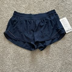 Lululemon Hotty Hot Shorts Navy 2.5” Inseam Low Rise Lined Running Nwt Pet Free Smoke Free Home. Navy Lululemon Shorts Outfit, Lululemon Shorts Collection, Navy Blue Lululemon Shorts, Running Outfit Aesthetic, Lulu Lemon Hotty Hot Shorts, Hotty Hot Shorts Lululemon, Lululemon Shorts Outfit, Athletic Outfit Summer, Running Shorts Outfit