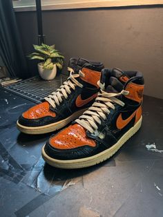 Elevate your sneaker game with these sleek and stylish Air Jordan 1 Retro OG High Shattered Backboard 3.0 sneakers. With a high top shoe shaft style, these sneakers feature a black patent leather upper material with a unique shattered backboard design. The iconic Jordan logo is prominently displayed on the side, making these sneakers a must-have for any sneakerhead. These sneakers come in a size 10 and are perfect for men who want to make a statement with their footwear. The Style Code 555088-028 and Release Date 20191027 add to the exclusivity of these sneakers. Don't miss out on the opportunity to add these Air Jordan 1 Retro OG High Shattered Backboard 3.0 sneakers to your collection. Item is pre-owned  see pictures for condition as is no original box comes with black and cream laces Air Jordan Shoe Collection, Shattered Backboard, High Top Shoe, Jordan Logo, Sneaker Games, Air Jordan 1 Retro, Black And Cream, Jordan 1 Retro, Air Jordan 1