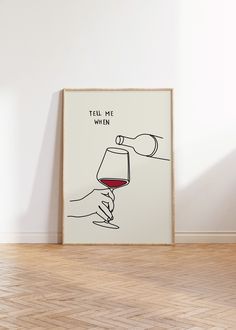 a poster with a hand holding a glass of red wine in it's left hand