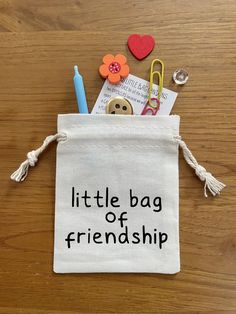 a little bag of friendship on a wooden table