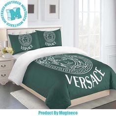 a green and white bed with versa on it