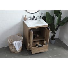 a bathroom with a sink, mirror and towel rack