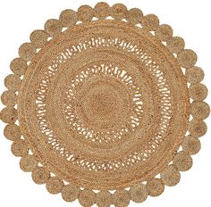 a round placemat made out of jute, with an intricate design on the center