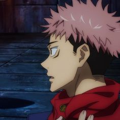 an anime character with pink hair and blue eyes looking off to the side while wearing a red scarf