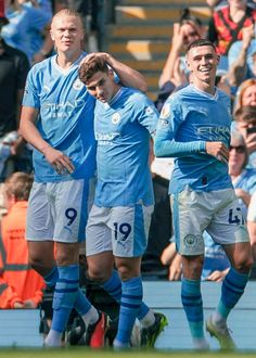 the soccer players are congratulating each other