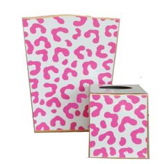 two boxes with pink and white designs on them