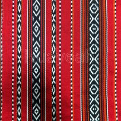 red, black and white striped fabric with an interesting design on the bottom half of it