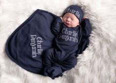 "This 3 piece personalized set make the absolute perfect baby shower gift or baby boy coming home outfit. Our rompers are super soft, roomy in size and have fold over feet and mittens. Fabric is a super soft cotton blend -light to medium weight perfect for year around wear and CPSIA tested and approved for your peace of mind. This listing features a navy sleeper, hat and blanket with white thread. ( Actual set colors may slightly vary from listing due to computer monitor/ phone settings and phot Baby Boy Swaddle, Baby Boy Winter Outfits, Baby Boy Gift Set, Personalized Baby Boy Gifts, Winter Baby Boy, Personalized Newborn, Girls Coming Home Outfit, Baby Boy Clothes Newborn