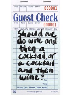 a check card with the words guest check written in black ink on top of it