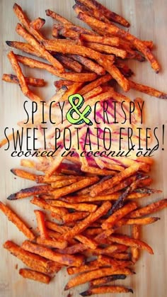 sweet potato fries on a cutting board with the words spicy & crispy sweet potato fries