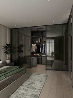 a bedroom with a bed, closets and plants in it's center area