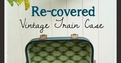 an old suitcase with the words recovered vintage train case