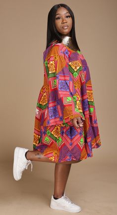 African print wax (Does not stretch) 100% cotton. You wear this dress with heels/sneakers. Very comfortable and free inside. Round neck and button at the back neck. Flare out dress.Below the kneeFlay sleevesTwo Side pockets All sales are FINAL. NO REFUND. Pls make sure when ordering. Pls inbox/dm for more information. Ankara Short Gown Styles With Sneakers, Oversized Hat, Ankara Short Gown Styles, Ankara Gown, Printed Short Dresses, Ankara Gown Styles, Short Gowns, Maternity Gowns, African Print Dress