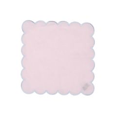 a pink place mat with scalloped edges on a white background in the shape of a rectangle