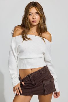 This fit is giving late '90s sitcom chic. Features - Off-the-shoulder construction - Rib knit Size & Fit - Fit: Fitted - Length: Cropped - Model is wearing size S Materials & Care - Content: 50% recycled polyester, 46% polyester, 4% spandex - Care: Machine wash, cold - Imported Dream Clothes Fall, Long Sleeve And Jeans, Off The Shoulder Knit Sweater, Clothes Sweaters, Neat Casual Outfits, Long Cardi, Garage Clothing, Off The Shoulder Tops, Oversized Sweater Cardigan