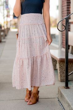 Feminine Tiered Maxi Skirt For Summer, Chic Flowy Tiered Skirt, Spring Tiered Maxi Skirt, Chic Tiered Maxi Skirt For Summer, Chic Relaxed Tiered Skirt, Feminine Long Skirt With Ruffle Hem, Feminine Tiered Ruffle Maxi Skirt, Chic Tiered Maxi Skirt With Ruffle Hem, Chic Floral Print Tiered Skirt