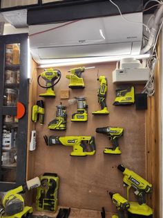 a bunch of tools that are sitting on a wall