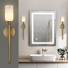 a bathroom with a sink, mirror and two lights on the wall next to it