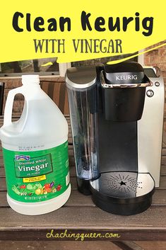 a bottle of vinegar next to a keurig coffee maker on a wooden bench