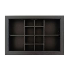 an empty black shelf with several compartments