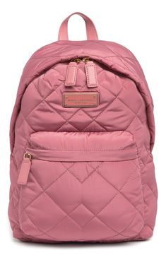 Quilted construction adds a luxe feel to this nylon backpack that makes for the perfect gift. 14" H x 14" W x 7" D 3" handle drop, 6-12" strap drop Single top handle Adjustable shoulder straps Two-way zip top closure Exterior features 1 zip pocket Interior features 1 zip pocket Perfect for school backpack or bookbag Nylon exterior and lining Imported Outfit Pieces, Rich Life, School Backpack, School Backpacks, Zip Top, All About Fashion, Dusty Rose, Shoulder Straps, Top Handle