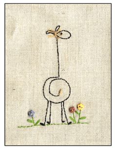 an embroidered picture of a giraffe standing in the grass with flowers around it