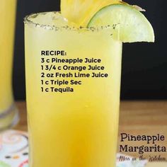 the recipe for pineapple juice is in a glass with a lime slice on top