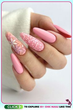 Almond-shaped acrylic nails with a pastel pink base and white floral nail art, perfect for weddings or spring events, showcasing aesthetic pink nails with a glossy finish. Pink Spring Nails, Floral Nail Art, Pink Spring, Floral Nails, Almond Nails