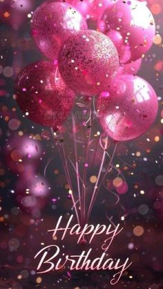 a bunch of pink balloons are in the air with sparkles on it and happy birthday