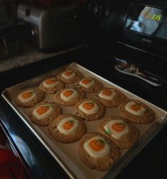 there are many cookies on the tray ready to be baked in the oven and eaten