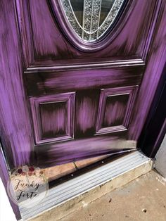 a purple door is painted to look like it's being used as a mirror