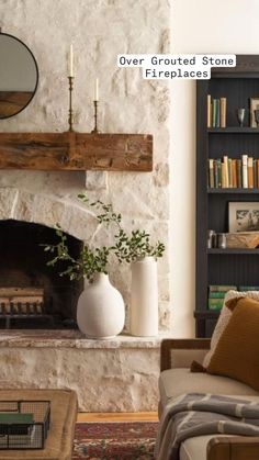 a living room filled with furniture and a fire place in front of a book shelf