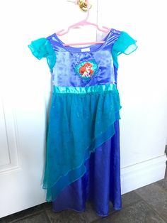 Disney Store  Ariel Little Mermaid  Dress  Size 4  Pull on (easy to put on - off, no closures, velcro etc.) Beautiful dress in great condition Comes from our pet and smoke free house Please ask questions should you have any Mermaid Dress Costume, Little Mermaid Dress, Little Mermaid Dresses, Ariel Costumes, Ariel Little Mermaid, Dress Costume, Disney Junior, Costume Outfits, Mermaid Dress