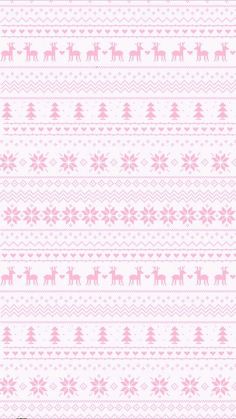 a pink and white knitted pattern with deers on the front, snowflakes in