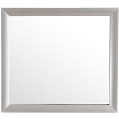 a white framed mirror with silver trim on the edges and bottom edge, against a white background