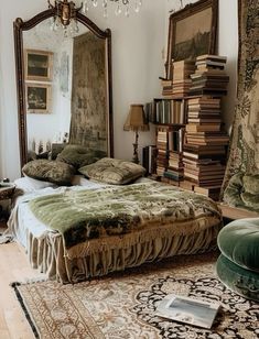 a bedroom with a large bed and lots of books