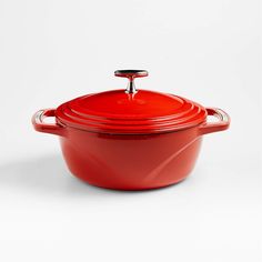 a red casserole on a white background