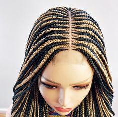 * Black and gold middle parting conrow braided wig * Neatly handmade with kanekalon synthetic braiding extensions * 2x4 lace closure * Has an elastic band at the base for a secure fit * The wig cap is breathable and expandable and fits most head size * Can be customized to any colour, length or style. Please contact me for more details. We've got loads of more beautiful braided wigs at https://eirenesbraidedwigs.etsy.com Shop our exquisite hair accessories here: https://aeirenesaccessories.etsy.com Fulani Braid, Braiding Extensions, Box Braids Wig, Wig For Black Women, Braided Wigs, Box Braid Wig, Fulani Braids, Braided Wig, Middle Parts