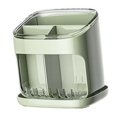 a close up of a juicer on a white background with clippings to the side