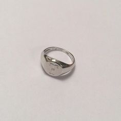 "Silver Pinky ring, Engraved ring, Initial Ring, Personalized Ring, silver letter ring, sterling silver - also suitable for men and women, Diameter: aprox' 0.7 mm = 0.27\" Please note in the \"notes to seller\" at checkout. : * state your ring size * letter you want to apper or to leave it blank The product will arrive to you packed in gift box and padded envelope to maintain the product Our jewelry are water resistant and comes with 1 year warranty For more rings from us: https://www.etsy.com/i Minimalist Hallmarked Sterling Silver Rings, Symbolic Engraved Signet Ring As Promise Ring, Symbolic Engraved Signet Ring For Promise, Minimalist Sterling Silver Dome Ring Stamped 925, Elegant Hallmarked Silver Initial Ring, Elegant Silver Hallmarked Initial Ring, Elegant Silver Rings With Engraving Option, Classic Sterling Silver Dome Promise Ring, Sterling Silver Dome Ring, Fine Jewelry Style