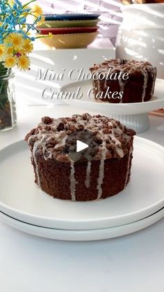 a chocolate cake sitting on top of a white plate