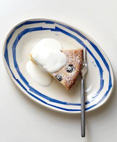 a piece of pie on a blue and white plate