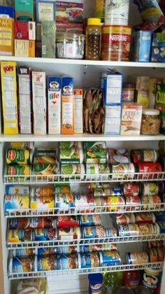 a refrigerator filled with lots of food and condiments on it's shelves