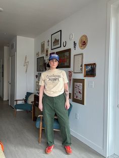 "90s military fatigue green pants  no tag size  Rise: 12\" Flat across: 19\" Inseam: 28\"  Thigh flat: 14\" hips: 23\" Boho, retro, 60s, 70s, 80s, and 90s vibes  Vintage items may have imperfections, if they are major or extremely visible they will be noted Smoke free home  No shedding pets Cleaned before mailing + urban outfitters  + free people + madewell  + vintage  Vintage items may/will probably have imperfections, if they are major or extremely visible they will be noted. Buying vintage items could mean they are different than what you had expected, but still just as lovely because they have lived a full life and have a story to tell!  We know that paying for shipping isn't ideal, but we are a small company and vintage items can be quiet heavy since they are made out of better materi Green Short Sleeve Turtleneck Outfit, Vintage Cargo Pants For Spring Streetwear, Retro Wide Leg Cotton Cargo Pants, 90s Green Wide Leg Pants, 90s Style Green Wide Leg Pants, 90s Style Green Wide-leg Pants, Retro Cotton Cargo Bottoms, Vintage Cargo Style Pants For Streetwear, Fitted Green Cargo Pants For Streetwear