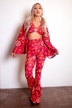 Say hello to your new favorite pants! Our Highwaist Bell Bottoms in Red Flowers are sure to be your go-to for those '70s-style grooves and disco nights! With their throwback style and fun pattern, you'll be turning heads in this retro pair of pants. Shake your groovy thing! This listing is for the pants ONLY. They are pictured with our matching Disco Ring Top. The pants are HIGH-WAISTED. The rise is approx 12". The inseam is 34.75", they are cut a little longer to wear with heels. They are made Flare Pants 70s, 70s Mode, Velvet Flare Pants, Disco Night, 70s Look, Velvet Set, 70s Outfits, Velvet Flares, 70s Style