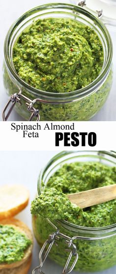 spinach almond pesto in a glass jar with a wooden spoon on the side