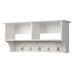 a white shelf with three hooks and two coats hanging on the wall, one coat rack