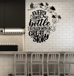 there is a wall sticker that says every bottle is filled with a great story